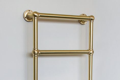 Satin Brass towel warmers from Hawthorn Hill can be matched to Perrin & Rowe Satin Brass bathroom tapware and accessories.