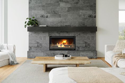 The TC950 inbuilt wood-burning fireplace features a pared-back aesthetic and a large firebox, which maximizes the display of flames.