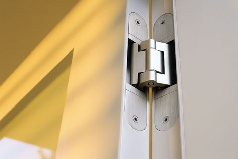 Concealed door hinge produces a clean and tidy look that gives the door a contemporary finish.