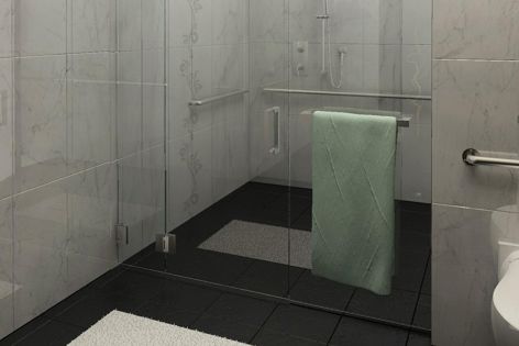 A unique elliptical swing maximizes the usable floor space beneath the Clear Space shower system.
