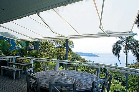 At the push of a button, Sunbrella awning fabrics can cover patios or decks within 90 seconds.