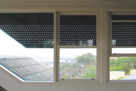 Blockout roller shutters can be custom designed to fit curved or irregularly shaped windows.
