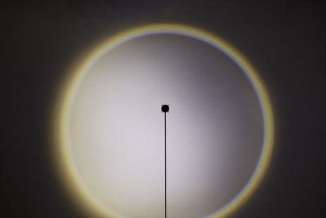 Moon floor lamp combines simple and elegant design.