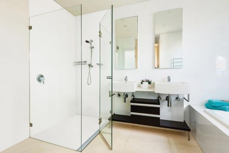With no grout lines, Corian surfaces are easy to clean, making them great for use in showers and on floors.