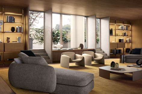 The Le Club Armchair by Poliform is available in a selection of fabrics and soft natural leathers.