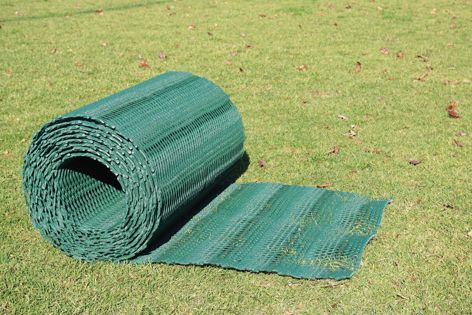 Grass intertwines with the GR11 mesh to provide a structurally strong, porous surface.
