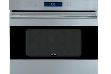 Wolf E Series ovens are available in classic stainless steel (pictured) or black glass finishes.